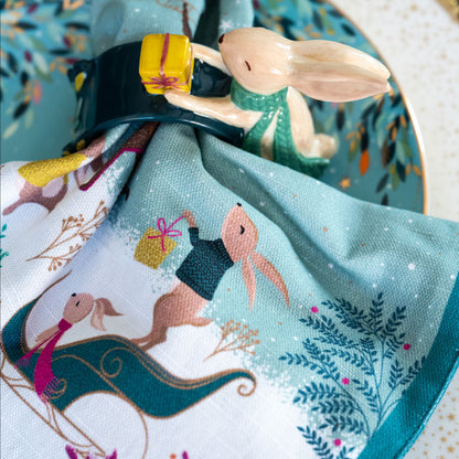 Close up on napkin inside the matching napkin ring.