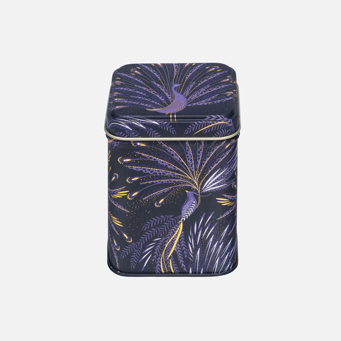 Small storage tin in peacock parade design with swooping tail feathers in velvety indigo.
