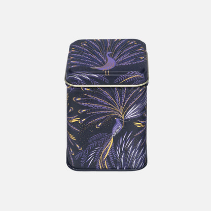 Small storage tin in peacock parade design with swooping tail feathers in velvety indigo.