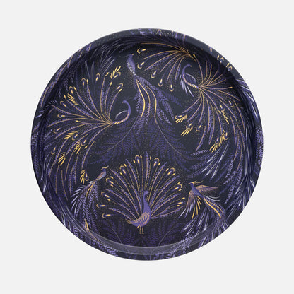 Round tin tray with peacock parade design, swooping tail feathers in velvety indigo.