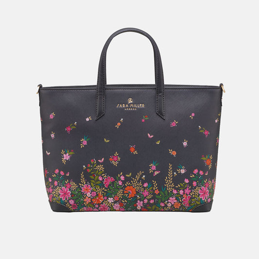 Ditsy floral medium tote bag with delicate floral design, white background.