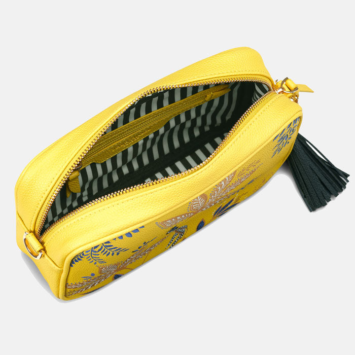 Shows inside of bag, black and white striped lining, internal zip pocket.