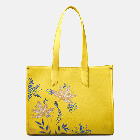 Yellow tote bag with floral design.