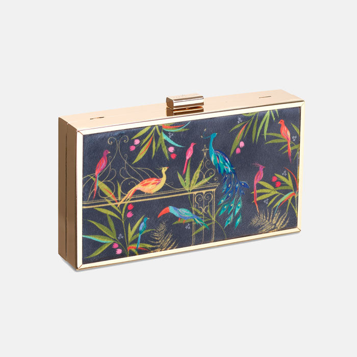 Clutch bag with colourful bird and floral design on a navy backdrop