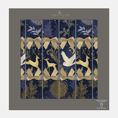 Decorative Christmas crackers with deer, bow, and star pattern on a blue background.