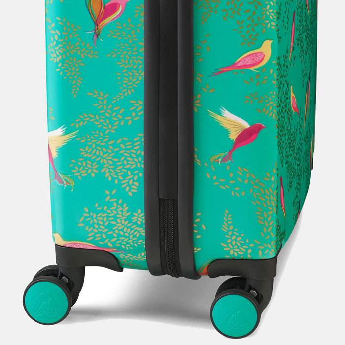 Shows wheels with Sara Miller London logo detail.