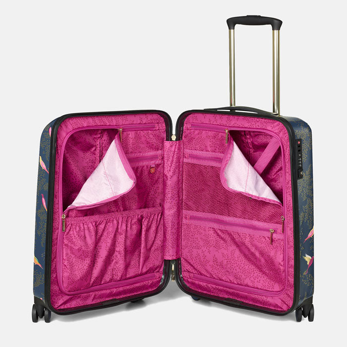 Inside of case with pink lining, and zipped compartments and pockets for organisation.