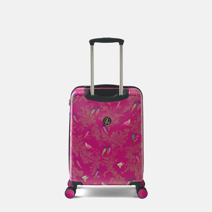 A pink hardshell suitcase with multicoloured bird motifs, featuring an extended telescopic handle and four spinner wheels.