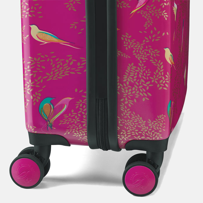 Shows wheels with Sara Miller London embossed logos.