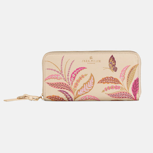 Large zip purse with floral design and gold zip.