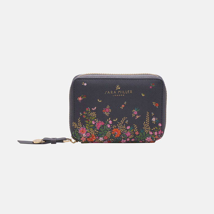 Ditsy floral small purse from front, white background.