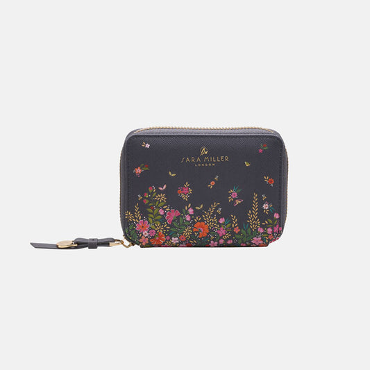 Ditsy floral small purse from front, white background.