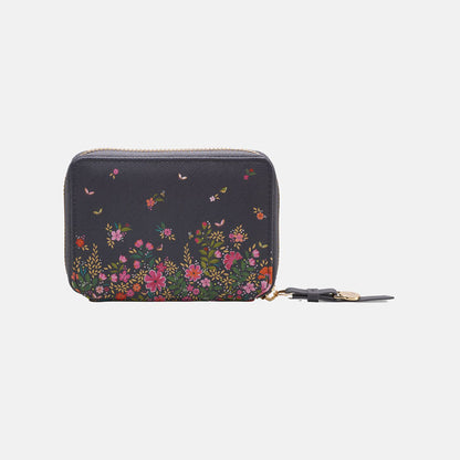 Ditsy floral small purse from back, white background.