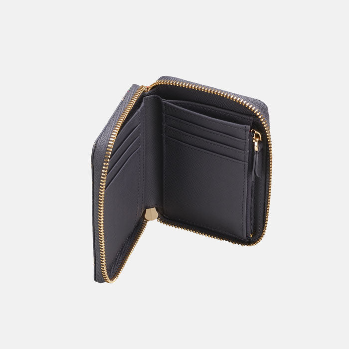 Inside of purse, plain blue material same as outside with internal zip pocket and various card holders.