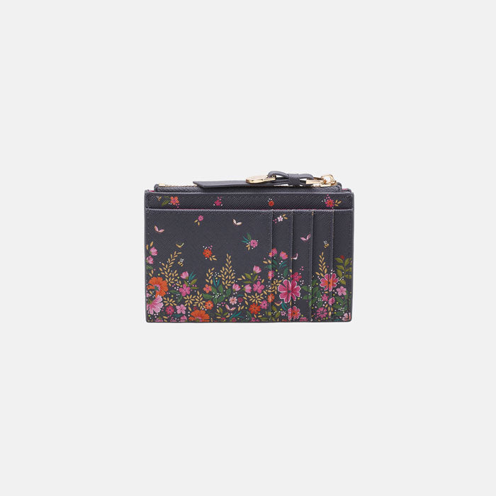 Ditsy floral card holder from back, can see card holder slots and zip top compartment. White background.