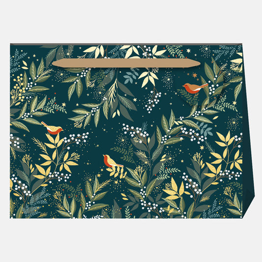 Gift bag with festive foliage design featuring leaves and robins on a dark green background