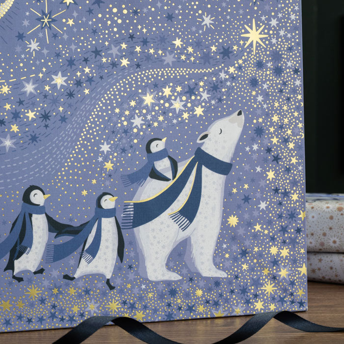 Close up on the design of the gift bag, can see textured finish on high quality paper and gold embellishment