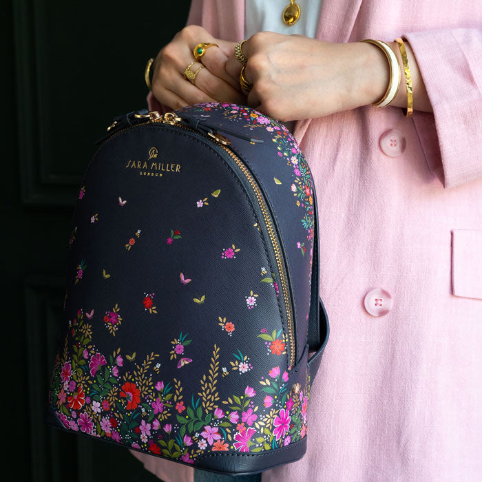 Model holding bag close up.