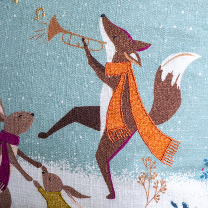 Close up of linen texture and embroidered detail.