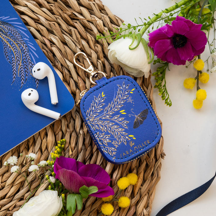 Cobalt earphones pouch with butterfly design and gold embellished details, and gold clip to attach to your bag.