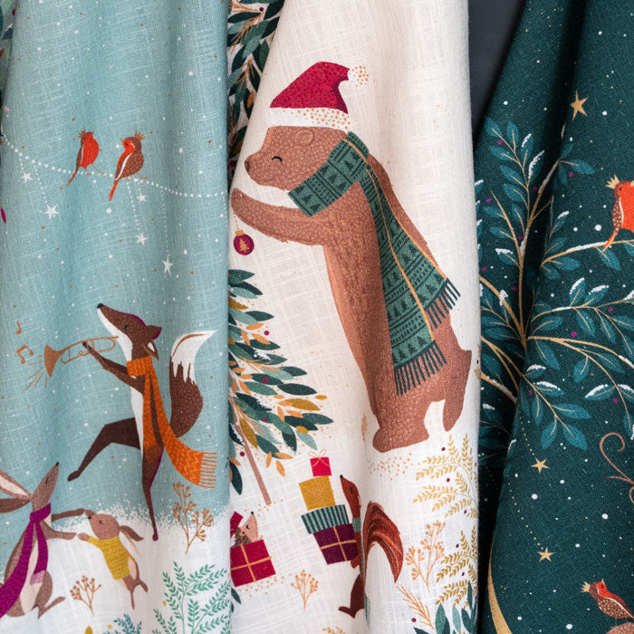 Tea towel with festive animal designs.
