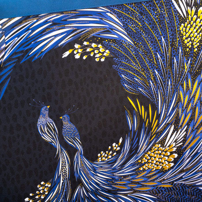 Close up showing the feather swirl print.