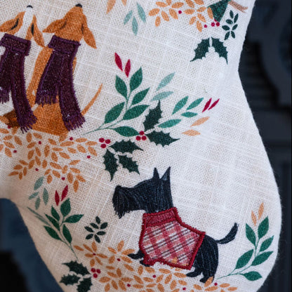 Embroidered Christmas stocking with dogs and foliage design