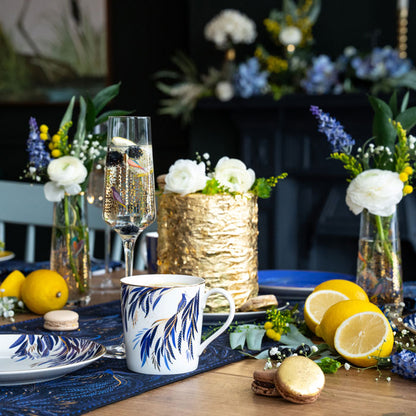 Champagne glass included in table setting.