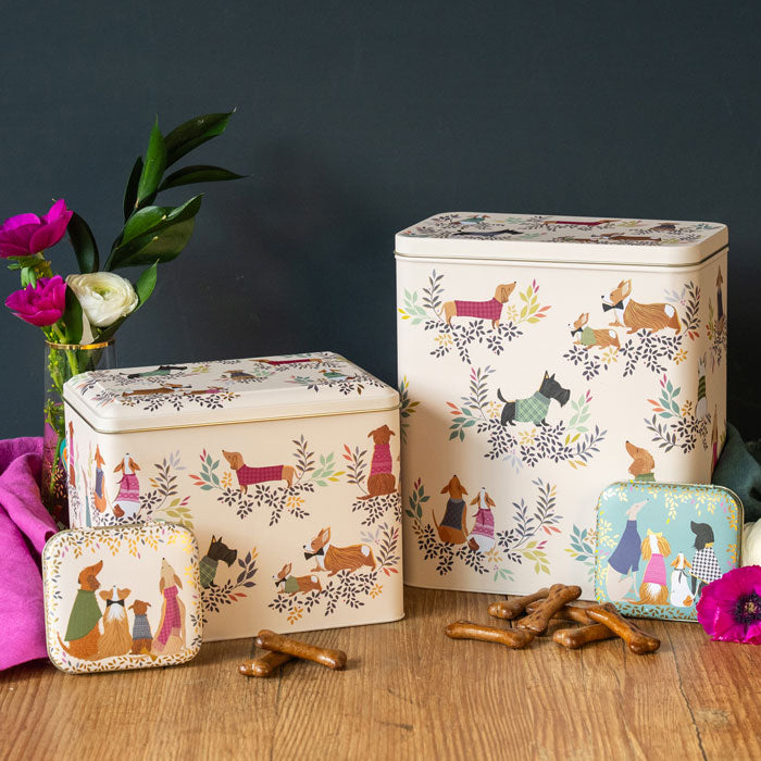 Tin storage containers with cute dogs design, light beige base.