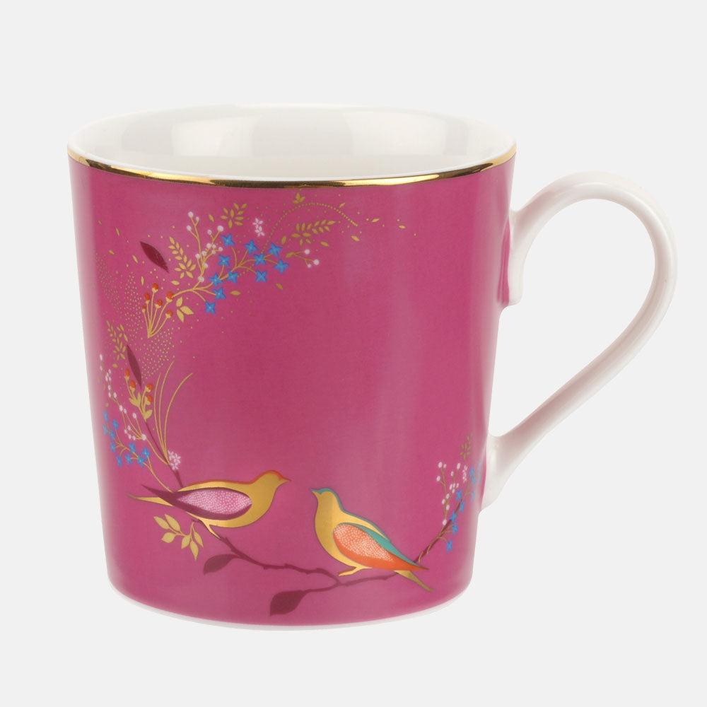 China mug in pink with birds on branch design.