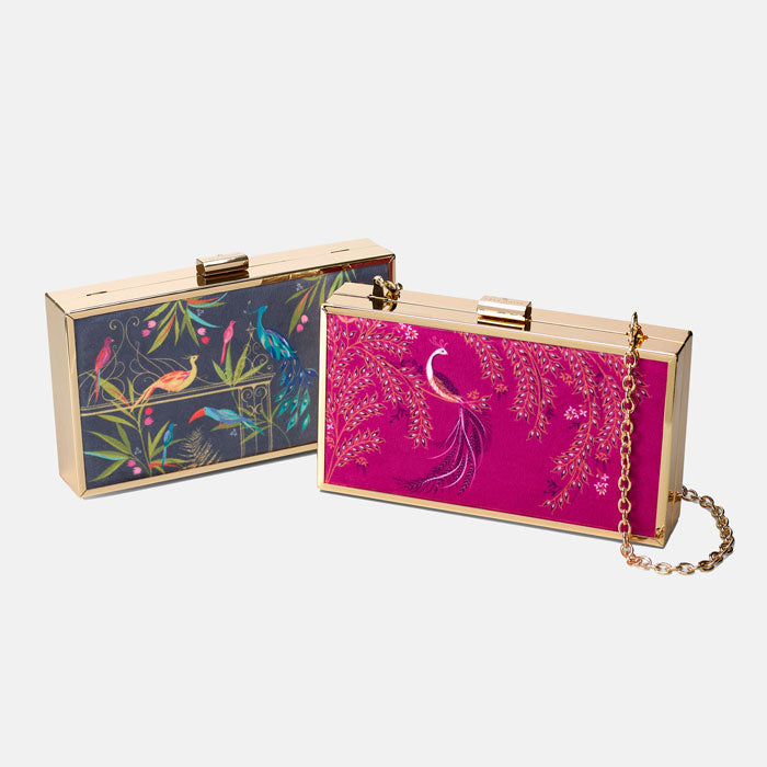 Two clutch bags with floral and bird designs 